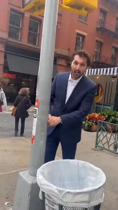 Haider Tawakali Rips Down Posters of Israeli Civilians Kidnapped by Hamas New York City Twitter Nov 22 2023_#14